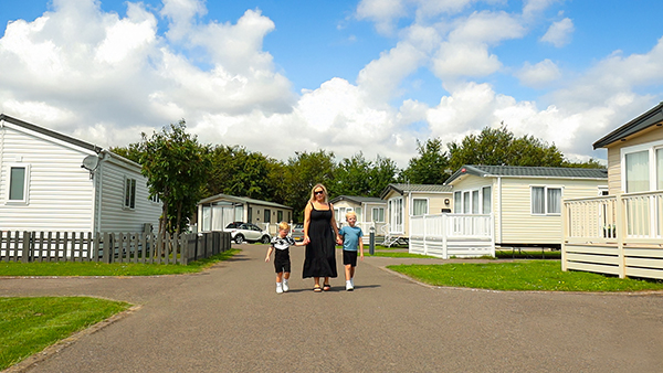 family in a caravan park